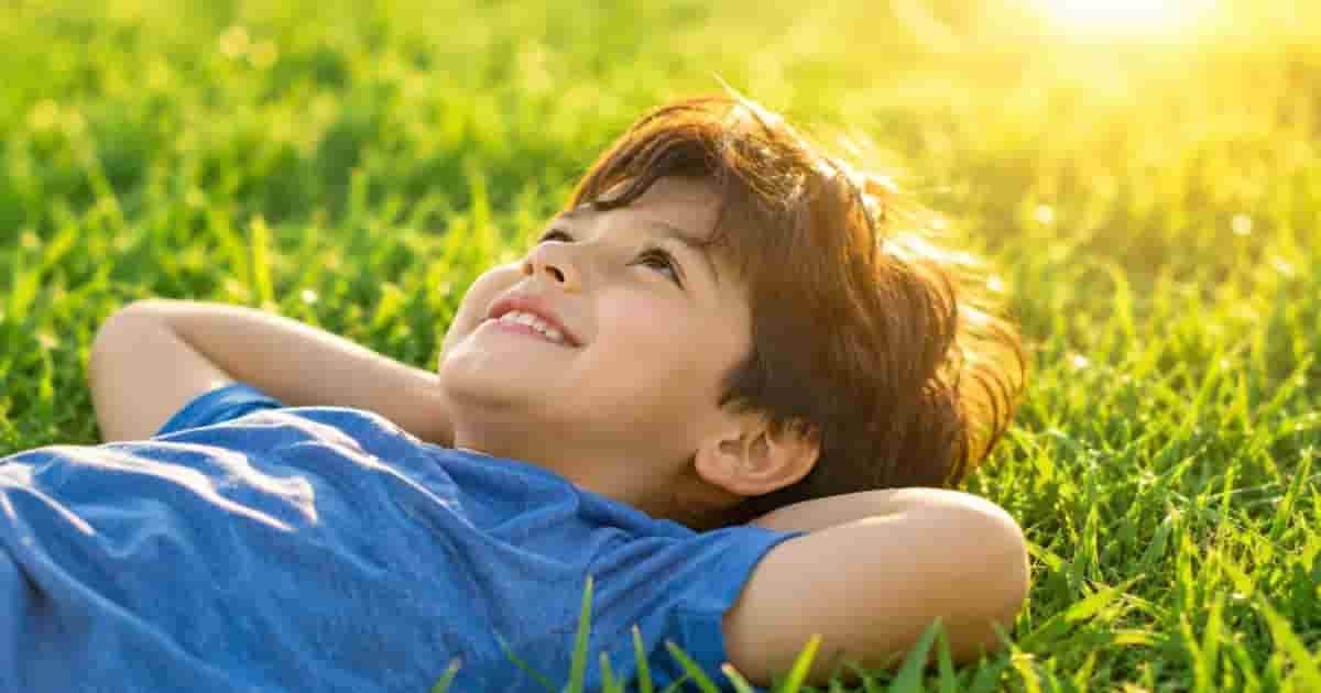 A boy in happy mood in Al Khuwair Park